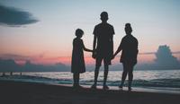A family of three watches the sunset. Generational trauma can affect your private practice, read this article to find out how to heal and in turn thrive in your business.