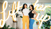 Two female practitioners stand side by side in an embrace, mentoring each other in SimplePractice's new mentorship program with words that say Lift Her Up