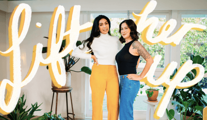 Two female practitioners stand side by side in an embrace, mentoring each other in SimplePractice's new mentorship program with words that say Lift Her Up