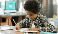 In an example of neuropsychological testing child sits at desk and completes the test