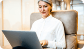 A therapist sits with her laptop open and looks through all the new features added to her SimplePractice account in 2024. Read about all the features SimplePractice released in 2024 to help you manage, build, and improve your private practice.