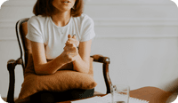 A client holds her hands together tightly as she makes a connection between her own experiences and her projections in therapy, using her awareness of transference to garner insight. This article explains transference psychology to therapists, and how they can use transference awareness to facilitate therapy.