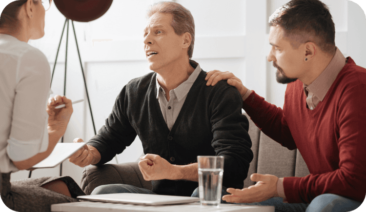 Two therapists and their client discuss emotional triggers in relationships.