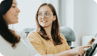 A client and a therapist discuss how AI in therapy tools work