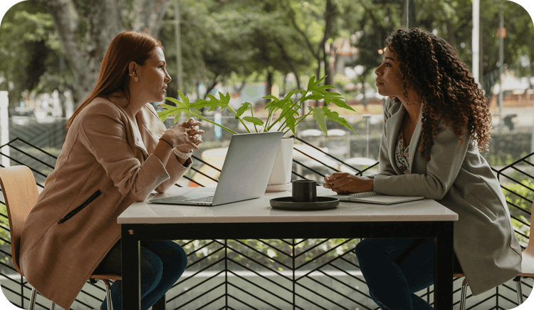 Two female therapists meet to discuss how to find a private practice mentor