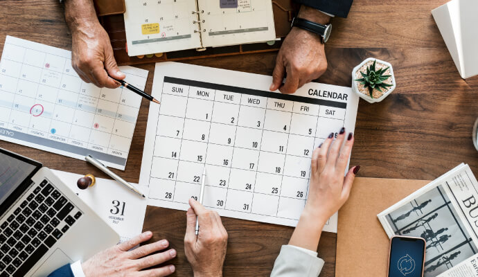 coworkers increasing productivity by scheduling together