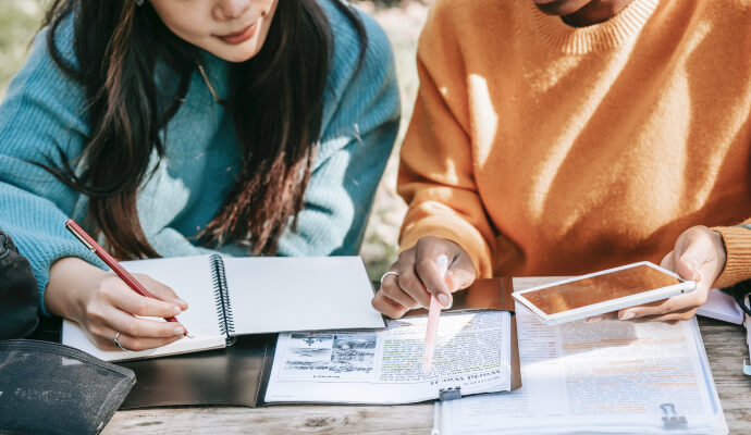 2 women studying for test