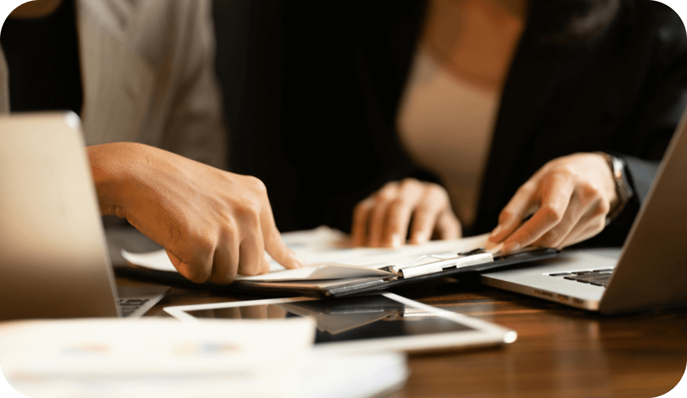 A therapist holds insurance claims and wonders how to prevent mental health insurance claim denials