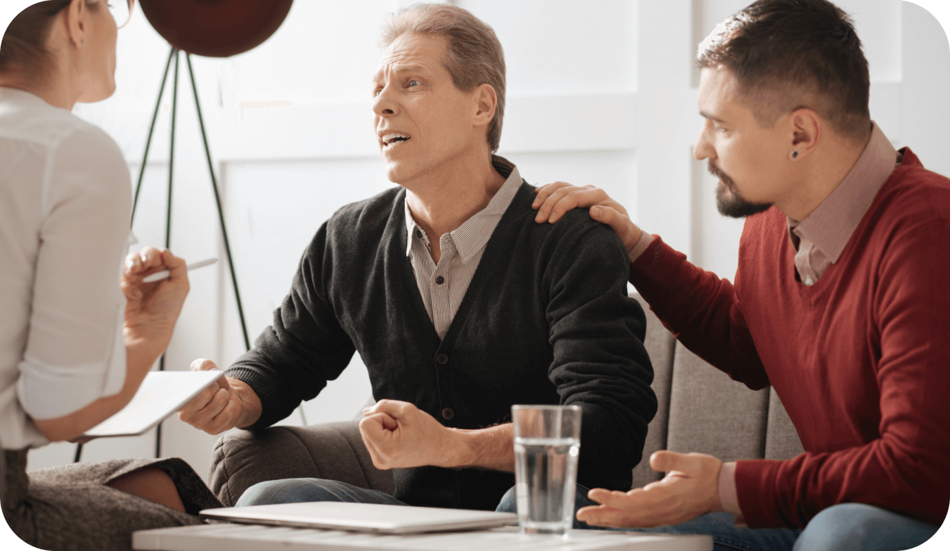 Two therapists and their client discuss emotional triggers in relationships.